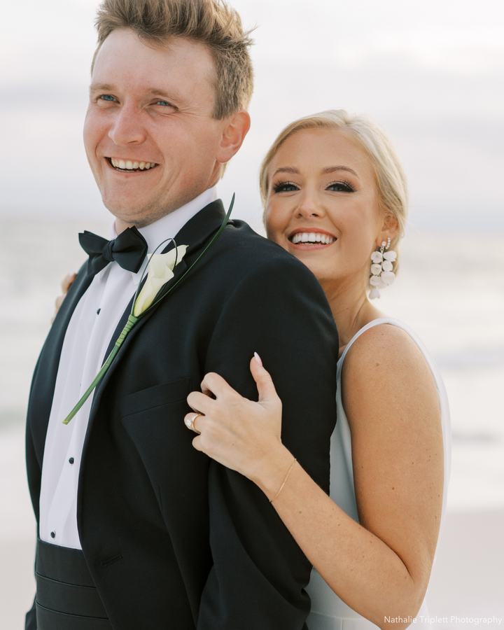 Floral ivory statement wedding earrings for a bride on her wedding day