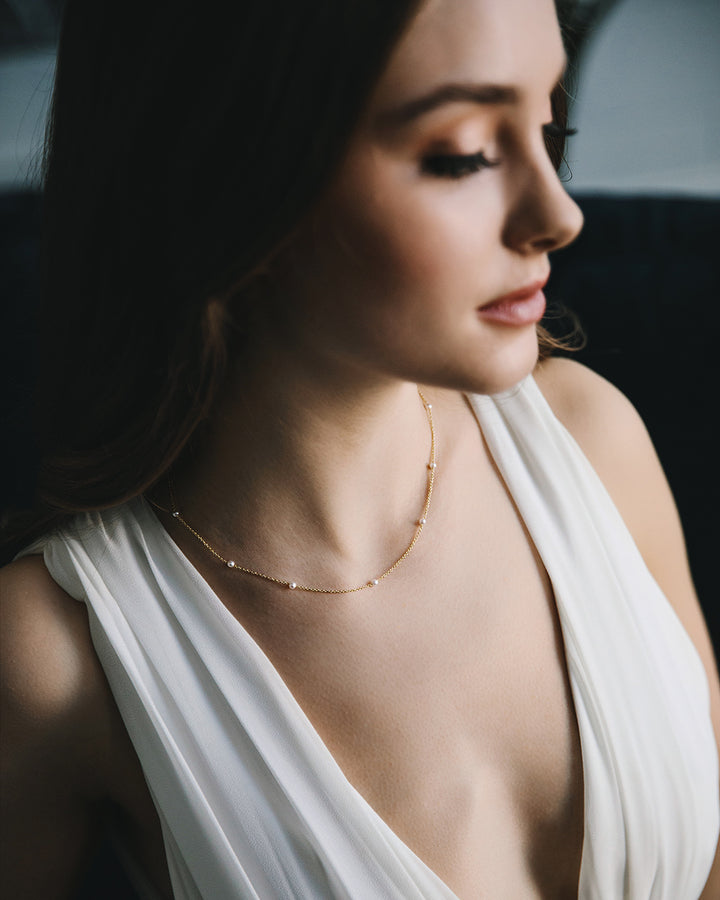 Gold and pearl chain necklace