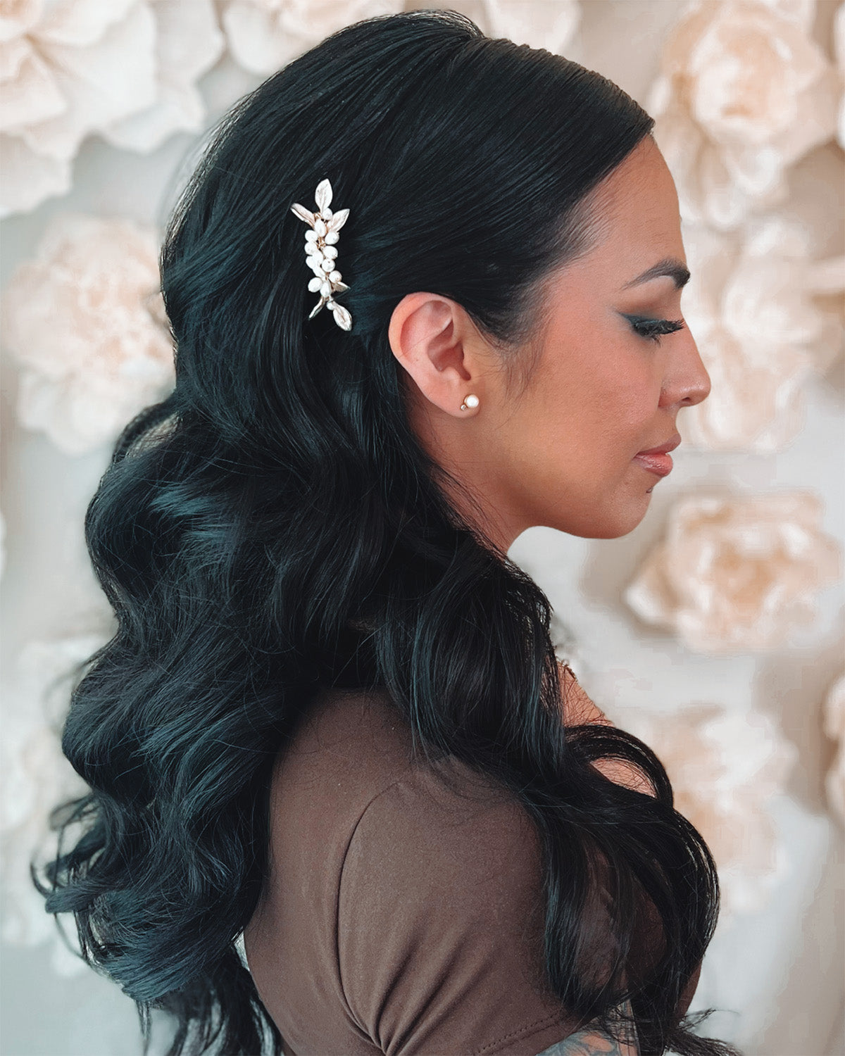 Freshwater pearl and gold flower hair pin in bride's wedding hairstyle
