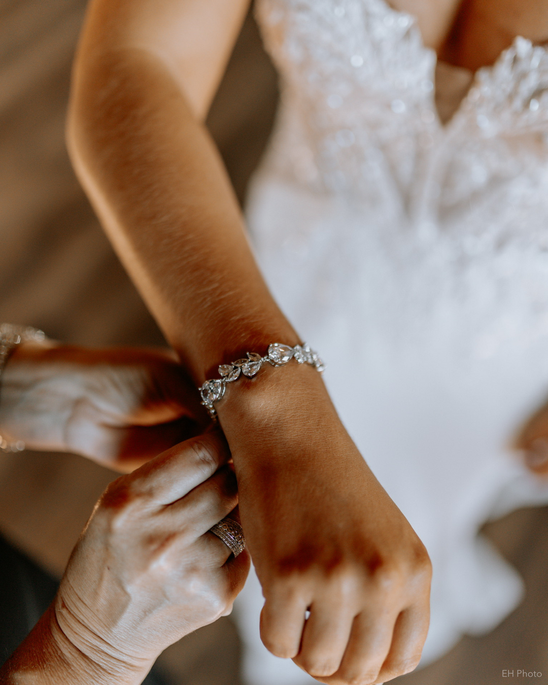 Bride on her wedding day wearing a cubic zirconia bracelet that sparkles like real diamonds