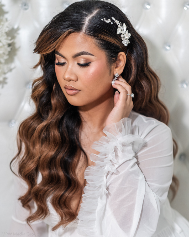 Bride wearing floral wedding hair accessory