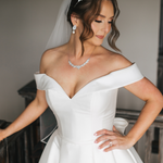 Bride wearing Dareth Colburn earrings and necklace