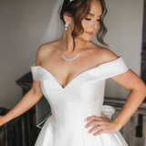 Bride wearing Dareth Colburn earrings and necklace