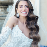 Bride wearing wedding veil with a pencil edge