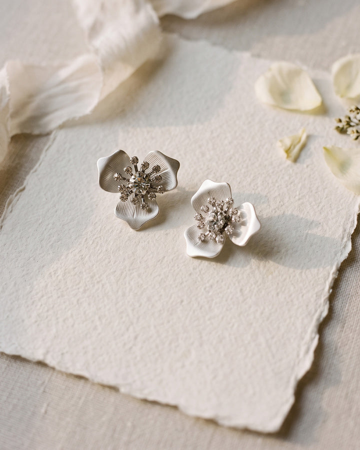 Kacie floral wedding earrings on deckle-edge paper with ivory petals