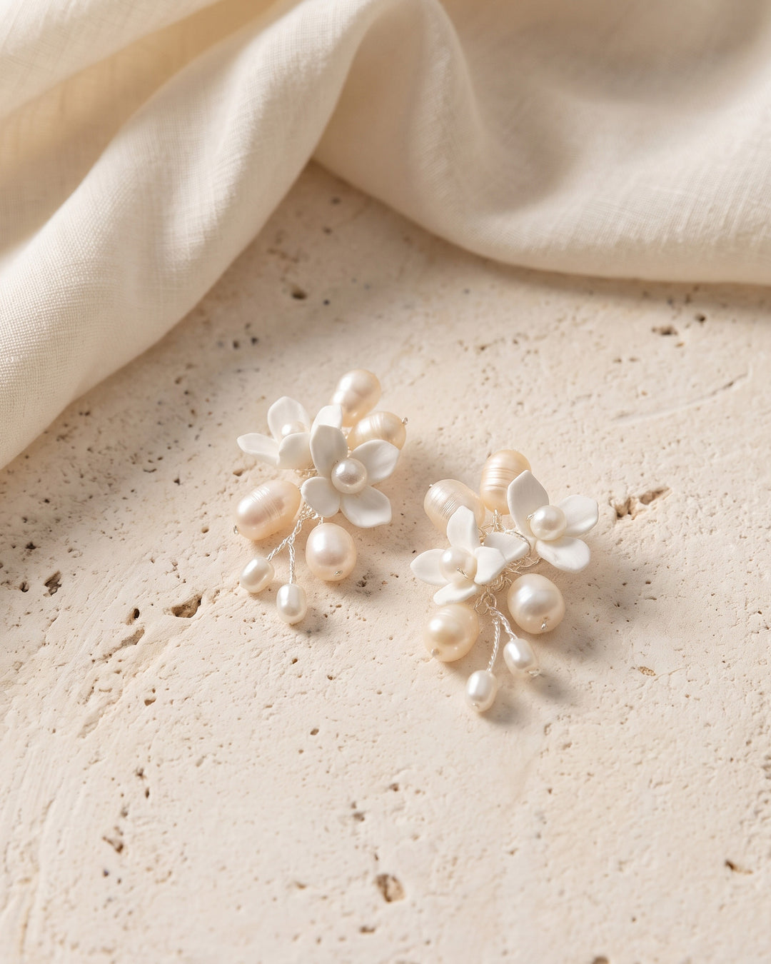 Close look at the soft florals and luminous pearls on the Taylor Petite earrings
