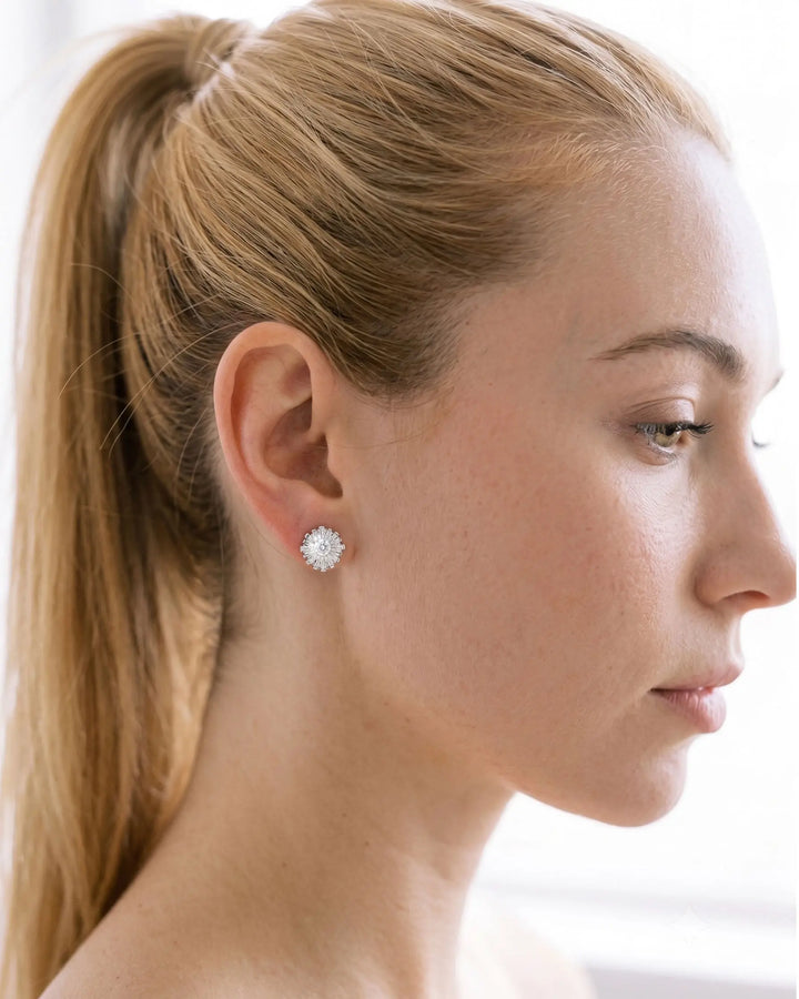 Side profile of bride in Shivani CZ stud earrings styled with ponytail