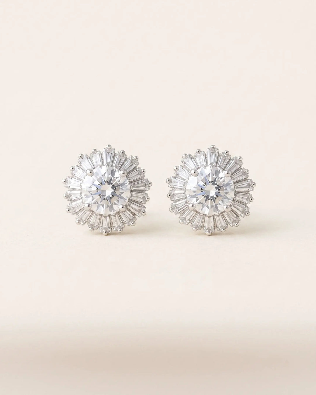 Shivani Studs — cubic zirconia sunburst stud earrings with baguette and round-cut stones in silver