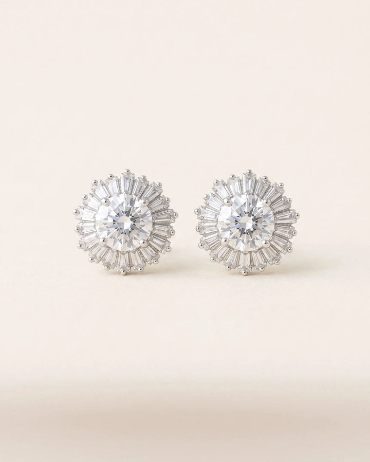 Shivani Studs — cubic zirconia sunburst stud earrings with baguette and round-cut stones in silver
