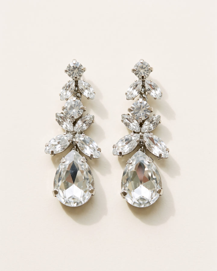 Tiana silver bridal earrings with a graduated cluster of marquise and teardrop-cut crystal