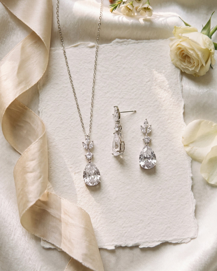 Candice teardrop pendant and earrings on handmade paper with silk ribbon and ivory roses