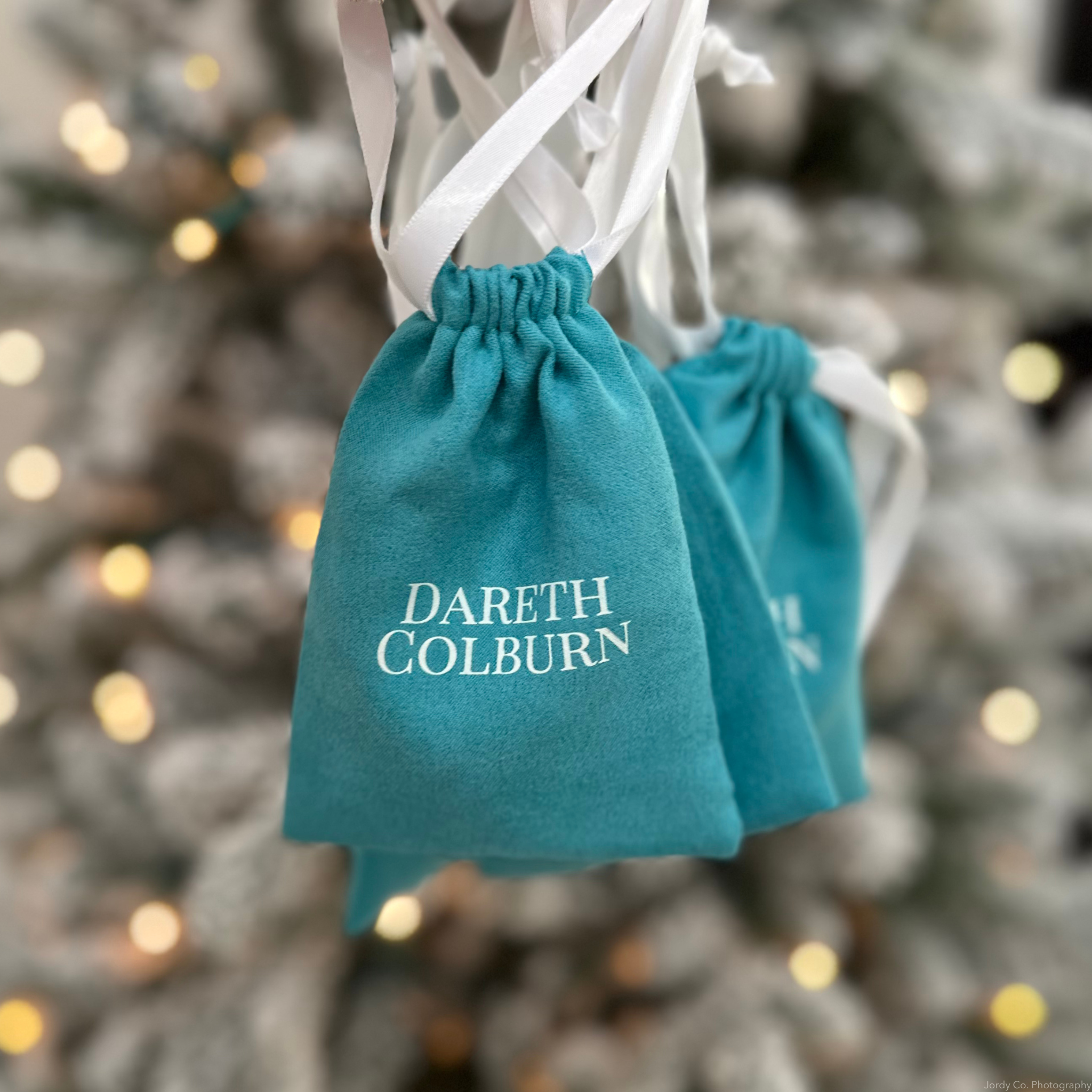 Dareth Colburn jewelry duster bags