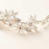 Close up of flower headpiece with pearls and rhinestones
