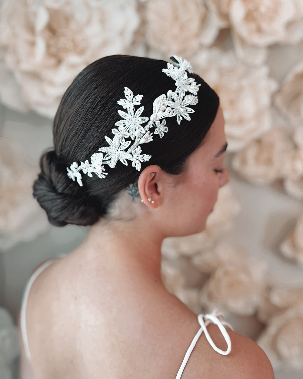 Bride hair accessory with flowers, pearls and rhinestones