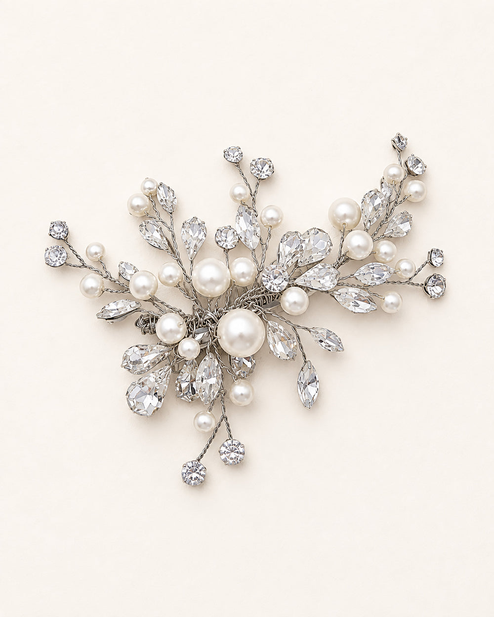 Silver hand-wired hair clip with a wispy spray of marquise rhinestones and pearls