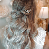 Floral hair pin with freshwater pearls in half up and down hairstyle