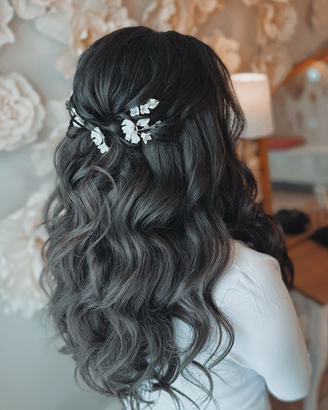 Flower hair pins in half up and down hairstyle