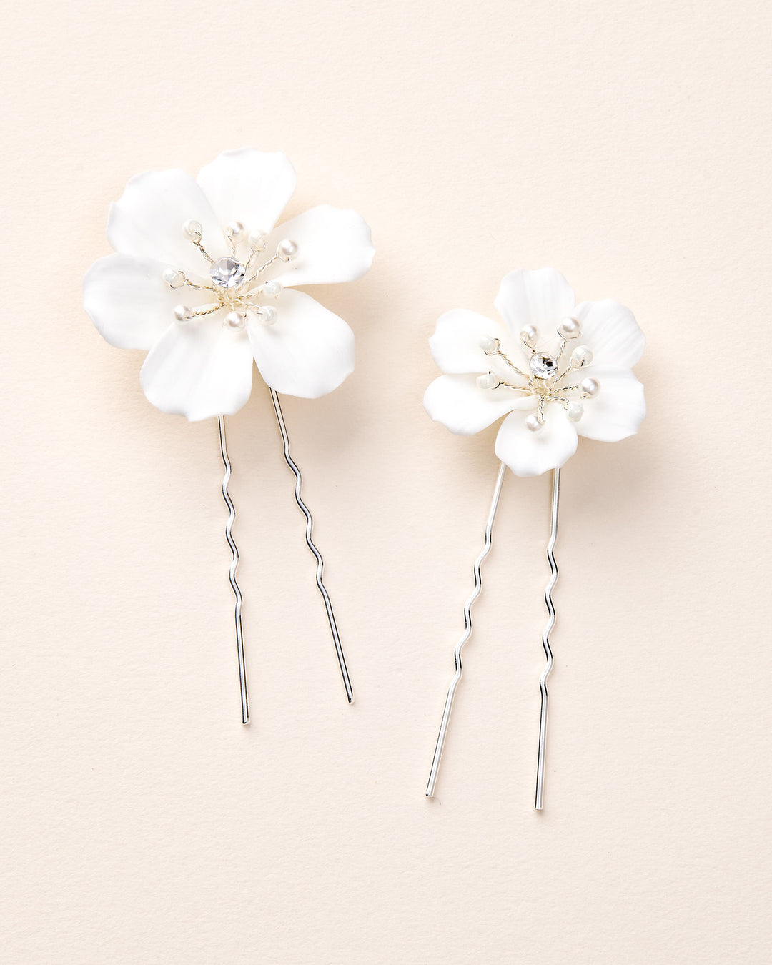 Two floral hair pins