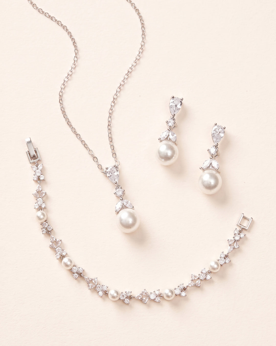 Kelsey Pearl Pendant, Earrings and Bracelet Set in silver, a matching bridal jewelry set with pearls and cubic zirconia